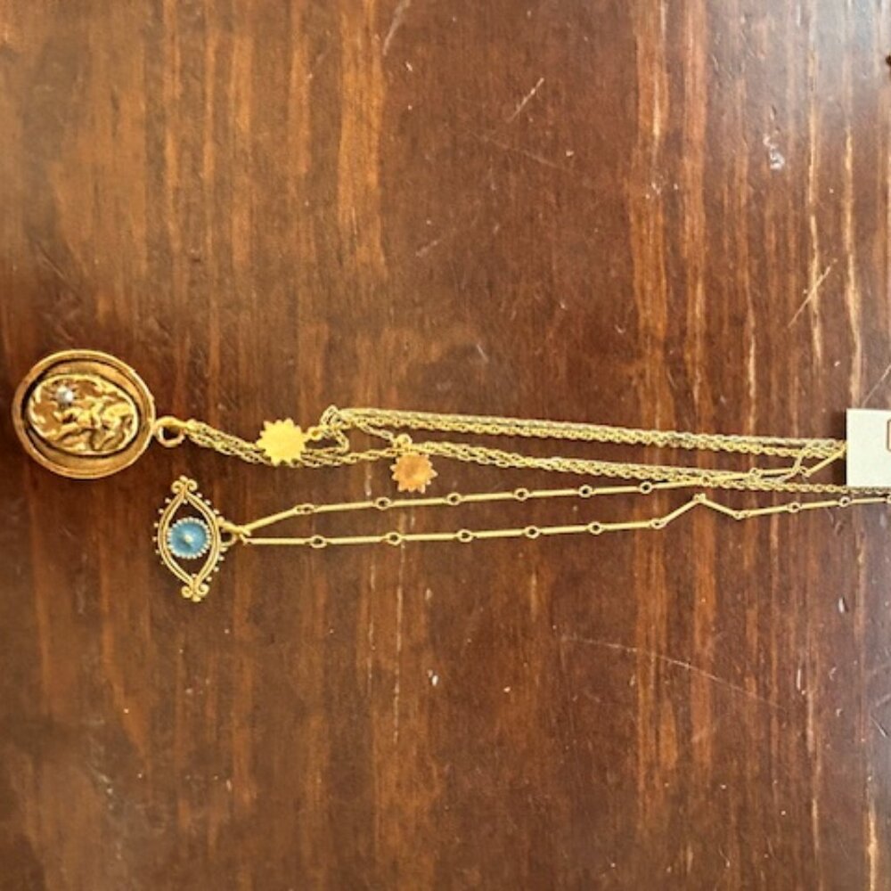 John Wind/Maximal Art three strand necklace with charms